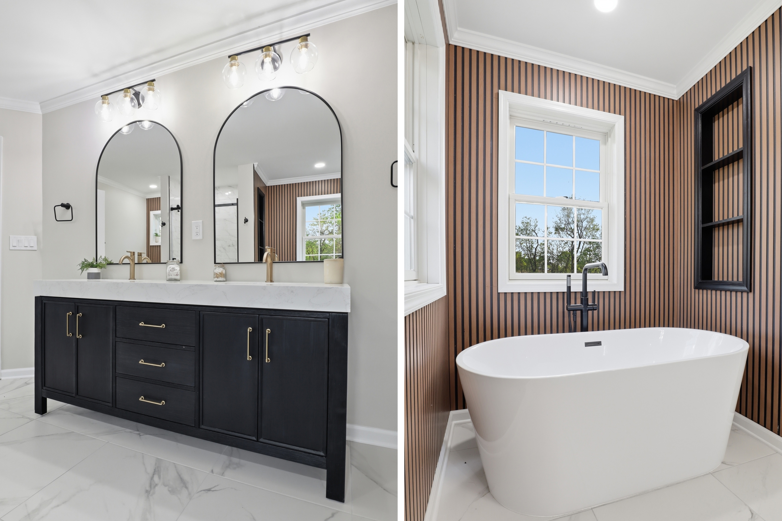 Black double vanity with arched mirrors and a freestanding tub against wood-slat walls